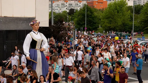 Stock image       Dance of huge dolls in honor of the opening of the holiday. Sarriguren Spain .6 June 2024                          