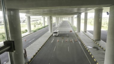Bridge view with airport pick up car.