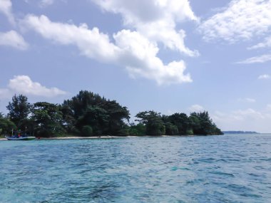 Beautiful island in the middle of the sea and blue sky.