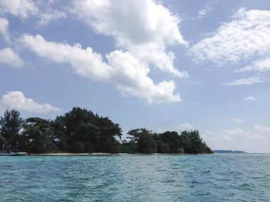 Beautiful island in the middle of the sea and blue sky.