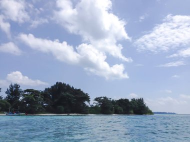 Beautiful island in the middle of the sea and blue sky.