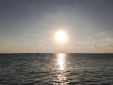 Sunset in the sea of Karimunjawa, Indonesia. 