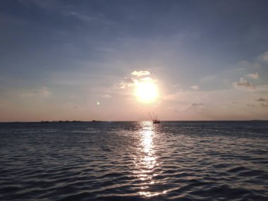 Sunset in the sea of Karimunjawa, Indonesia. 