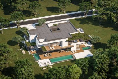 Otoparkı ve havuzu satılık ya da kiralık iki katlı evin beton cepheli ve arka planda güzel bir peyzajı var. Mavi gökyüzü açık güneşli bir yaz günü.