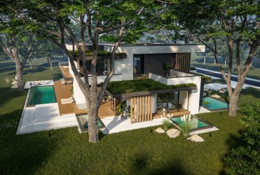 Otoparkı ve havuzu satılık ya da kiralık iki katlı evin beton cepheli ve arka planda güzel bir peyzajı var. Mavi gökyüzü açık güneşli bir yaz günü.