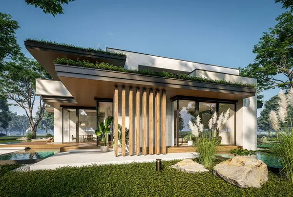 Otoparkı ve havuzu satılık ya da kiralık iki katlı evin beton cepheli ve arka planda güzel bir peyzajı var. Mavi gökyüzü açık güneşli bir yaz günü.