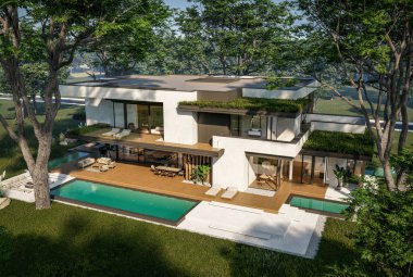 Otoparkı ve havuzu satılık ya da kiralık iki katlı evin beton cepheli ve arka planda güzel bir peyzajı var. Mavi gökyüzü açık güneşli bir yaz günü.