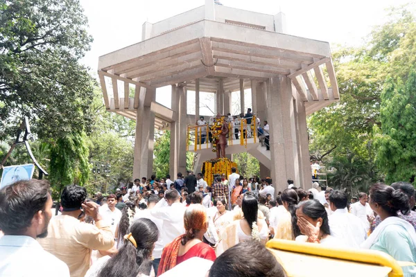 stock image Pune,India - 14 April 2022 : People garland and pay respect to Dr B.R. Ambedkar, who wrote Indian constitution, statute on 131 anniversary celebrations.