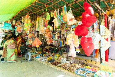 AMRAVATI, MAHARASHTRA, INDIA 04 MARCH 2019: Unidentified vendor selling Traditional various goods to rural people at annual village Fair.