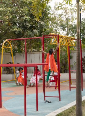 children playing on the colorful playground