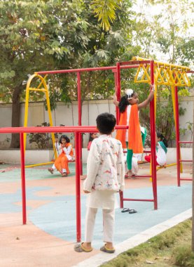 children playing on the colorful playground