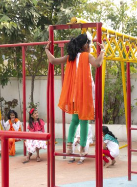 children playing on the colorful playground