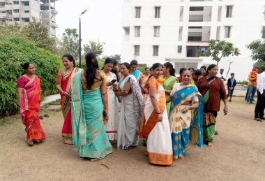 PUNE, MAHARASHTRA, INDIA, JANUARY - 26, 2023: Unidentified people celebrating the India Republic day with flag in society of city. Independence Day or Republic Day concept.
