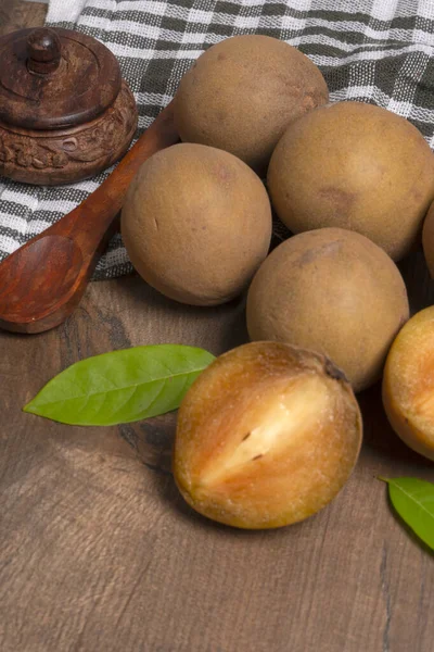 stock image Sapodilla fruit (Manilkara zapota) and other names such as sapota, chikoo, chico, naseberry, or nispero. Sapodilla is tropical fruit evergreen tree and sweet taste fruit.