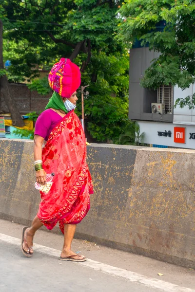 stock image Jaipur, Rajasthan, India : August 11, 2019: People performing Kavad Yatra, annual pilgrimage of devotees of Shiva, Pilgrims fetch holy water of Ganges to their local Shiva temples