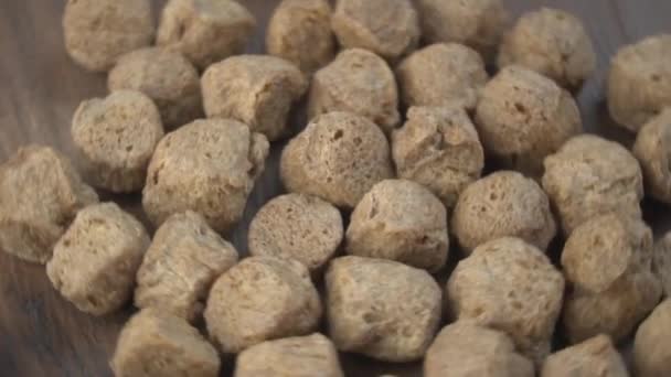 Raw Soya Chunks Wooden Background Healthy Nutritious Soybean Meat Chunks — Stock Video