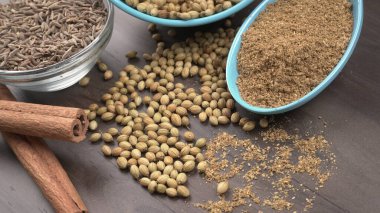 Indian Spices and herbs on wooden background. Food and cuisine ingredients