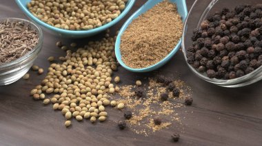 Indian Spices and herbs on wooden background. Food and cuisine ingredients