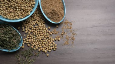 Indian Spices and herbs on wooden background. Food and cuisine ingredients