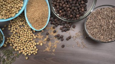 Indian Spices and herbs on wooden background. Food and cuisine ingredients