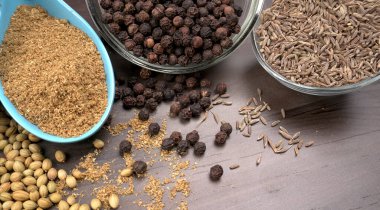 Indian Spices and herbs on wooden background. Food and cuisine ingredients