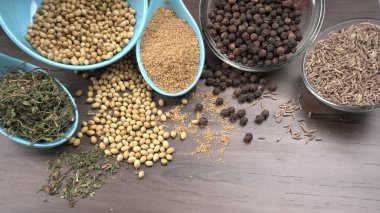 Indian Spices and herbs on wooden background. Food and cuisine ingredients