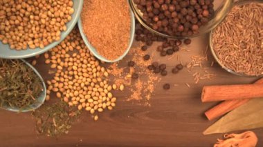 Indian Spices and herbs on wooden background. Food and cuisine ingredients