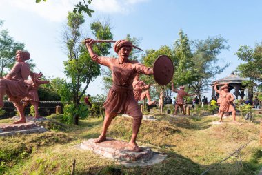 Pune, Maharastra,India - November 18 2019: Statues of a tribal warriors from India. Indigenous communities who took revolt against colonial powers. clipart