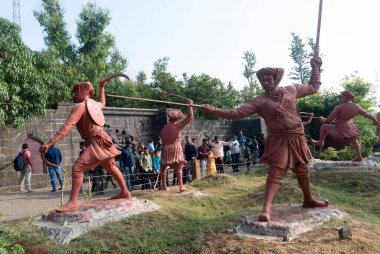 Pune, Maharastra,India - November 18 2019: Statues of a tribal warriors from India. Indigenous communities who took revolt against colonial powers. clipart