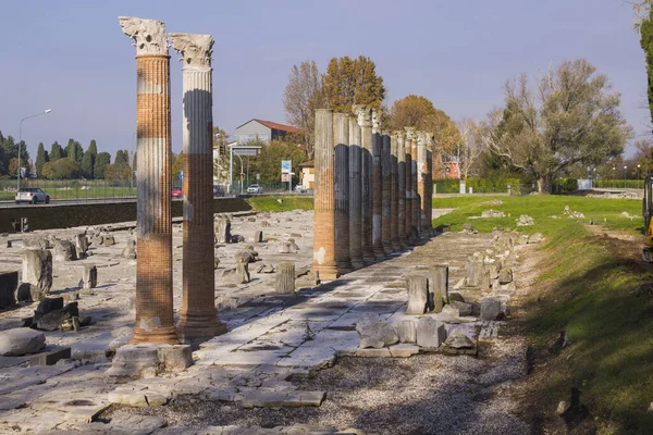 Aquileia, Italy - A view of the archaeological area also called The Second Rom showing well preserved roman columns and excavations, considered part of the Heritage of mankind by Unesco.