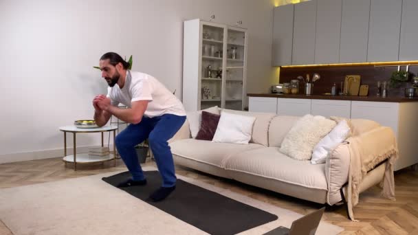Active Bearded Man Having Workout Yoga Mat Instruction Video Online — Vídeo de Stock