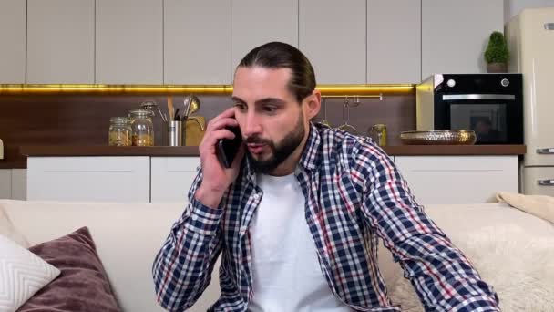 Annoyed Mid Adult Man Talking Using Phone Upset Hearing Bad — Stock Video