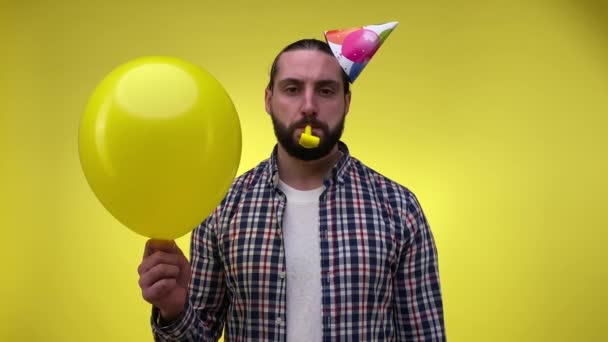 Sad Mid Adult Man Festive Party Cap Blowing Birthday Party — Stock Video