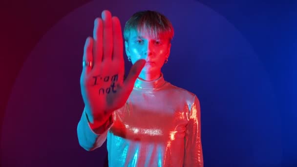 Young Adult Woman Showing Palms Affirmation Victim Colorful Lighting Indoors — Stock Video