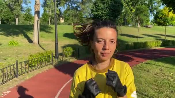 Multiracial Young Woman Sport Gloves Engages Focused Boxing Routine Delivering — Stock Video