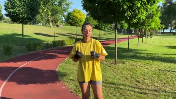 Sporty Multiracial Young Woman Sport Gloves Engages Dynamic Boxing Workout — Stock Video