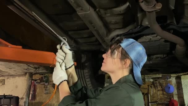 Young Woman Coveralls Works Car Service Station Performing Technical Car — Stock Video