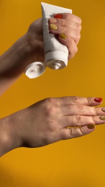Beauty Daily Skincare Concept Female Hand Holds Tube Moisturizing Hand — Stock Video