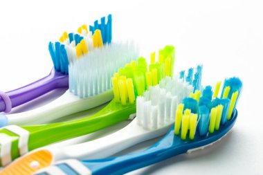 Toothbrushes on white background. Oral hygiene. 