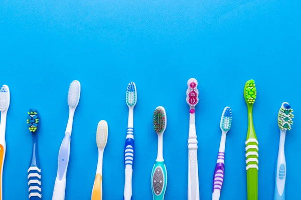 Toothbrushes Blue Background Space Text Top View Dental Concept — Stock Photo, Image
