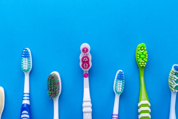 Toothbrushes Blue Background Space Text Top View Dental Concept — Stock Photo, Image