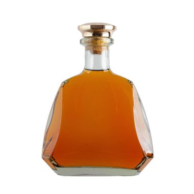 Bottle of amber color premium alcohol, isolated on white background.  Mock-up of whisky, brandy, cognac or rum design. File contains clipping path.