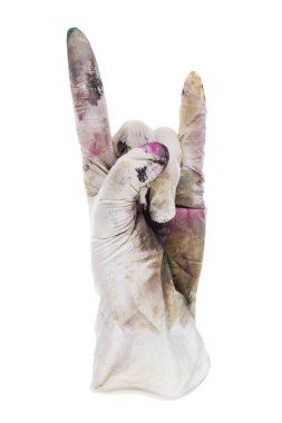 Heavy metal fingers in a rubber glove stained with paints. Isolated on white background. File contains clipping path.