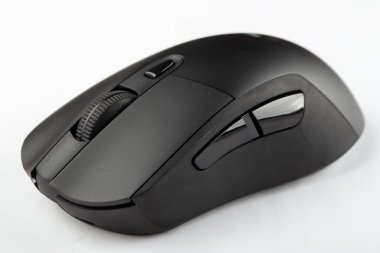 Black wireless computer mouse on a white background. Accessories for computer equipment