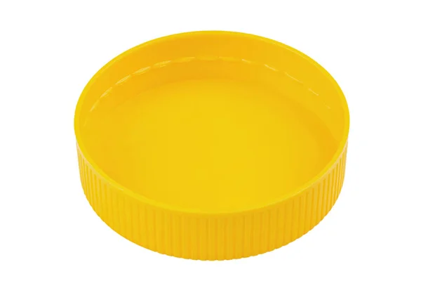 白色の背景に分離された黄色のプラスチック製の蓋 プラスチック製の丸瓶蓋 ファイルにクリッピングパスが含まれています — ストック写真