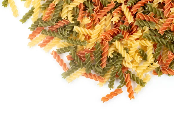 Raw Colored Pasta Fusilli White Background Space Text Top View — Foto Stock