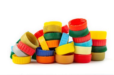 colorful plastic caps on white background, recycle for environment concept. Separate waste sorting.