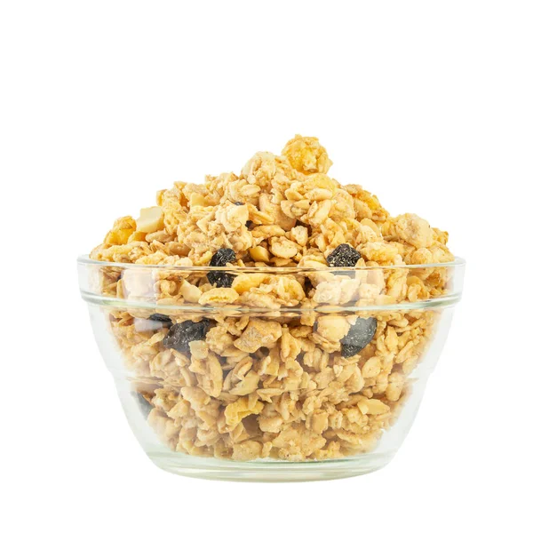 stock image Dry breakfast muesli in a glass plate. Isolated on white background. File contains clipping path