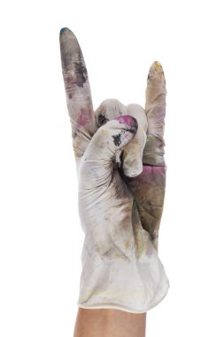 Heavy metal fingers in a rubber glove stained with paints. Isolated on white background. File contains clipping path.