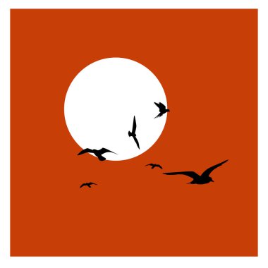 Kuşların gökyüzünde uçtuğu bir günbatımı